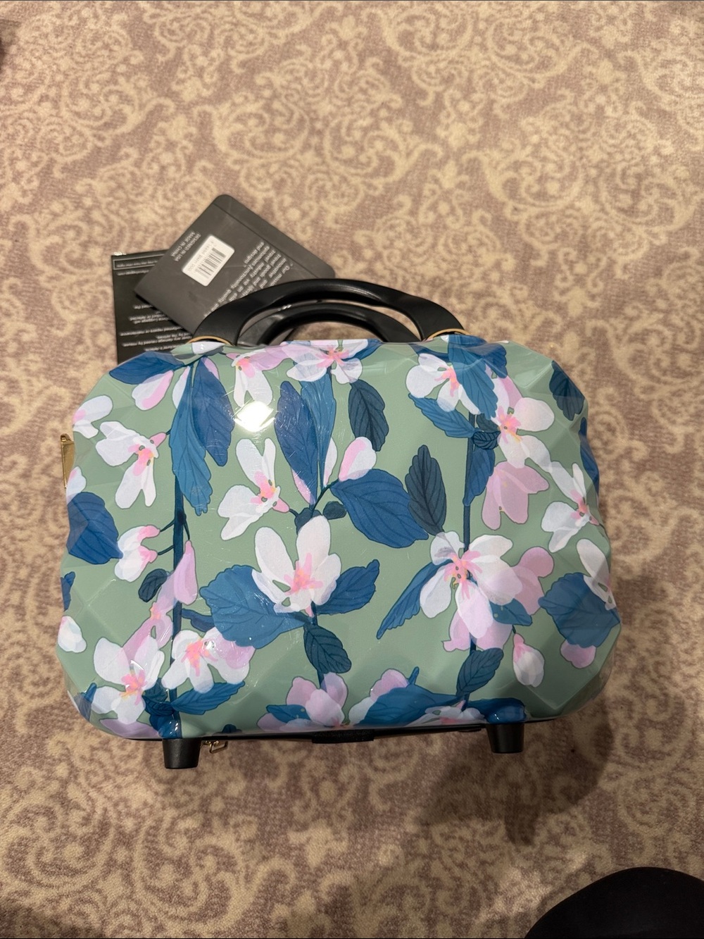 Floral travel Bag in Sage Green with many different compartments of all sizes